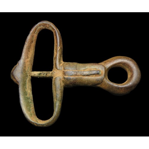 90 - Norman zoomorphic hunting leash buckle. Circa 12th century AD. Copper-alloy, 45mm x 37mm, 14.7g. The... 