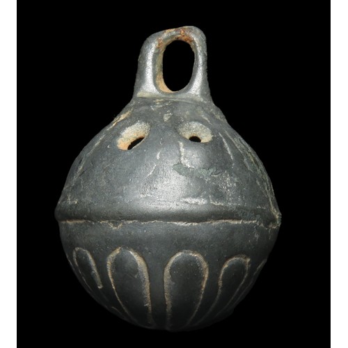 111 - Crotal bell. Circa 17th-18th century AD. Copper-alloy, 37mm diameter x 49mm, 46.5g.  Complete with o... 