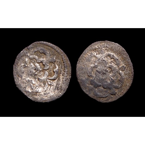 334 - Charles I halfpenny. Silver, 9mm, 0.15g. obv: Central rose. Rev: Central rose. Ref: North 2274. Spin... 