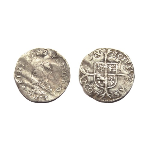 322 - Elizabeth I penny, first issue (1559-60) dated on the obverse 1558. Silver, 0.55g. 14.56 mm. Obv: cr... 