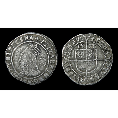 325 - Elizabeth I threepence. Silver, 20mm, 1.44g. Obv: crowned left facing bust, rose below, +ELIZABETH D... 