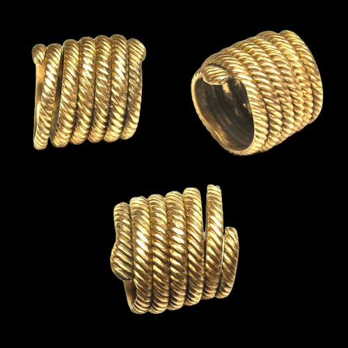 106 - Gold Coiled Snake Ring. Circa 1800?. 4.37g. 14.32 mm. Gold narrow spiral snake-like ornament with on... 