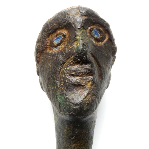 1032 - Roman anthropomorphic bronze knife handle. The handle has a cylindrical body terminating at one end ... 