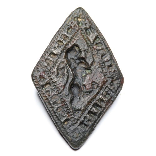 1060 - Medieval Seal Matrix, Circa 14th century AD. Copper-alloy, 7.69g. 31.50 mm. A lozenge-shaped matrix ... 