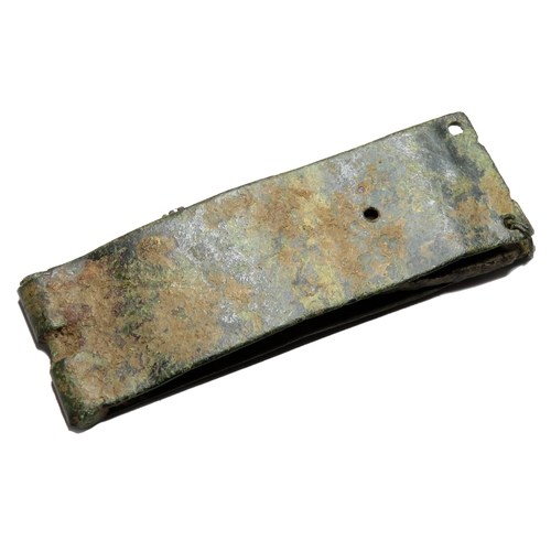 1061 - Medieval buckle plate. Circa 14th century AD. Copper-alloy, 14.75g. 61.15 mm. A long strap plate det... 