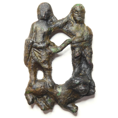 1063 - Medieval Figural Brooch. Circa 12th-13th Century AD. Copper-alloy, 11.66g. 43.34 mm. An open-work br... 