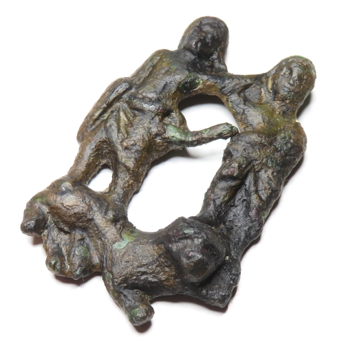 1063 - Medieval Figural Brooch. Circa 12th-13th Century AD. Copper-alloy, 11.66g. 43.34 mm. An open-work br... 