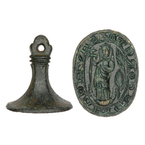 1065 - Medieval Seal Matrix. Circa 14th century AD. Copper-alloy, 13.02g. 26.88 x 24.99 mm. A chessman type... 