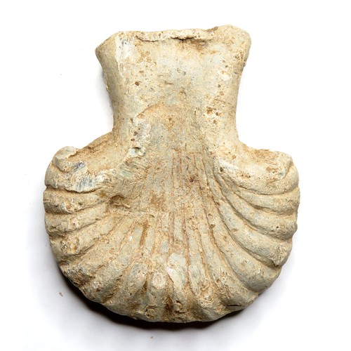 1072 - Pilgrims ampulla. C. 14th century AD. Lead, 44mm x 39mm, 51.1g. Scallop shell type with wide taperin... 