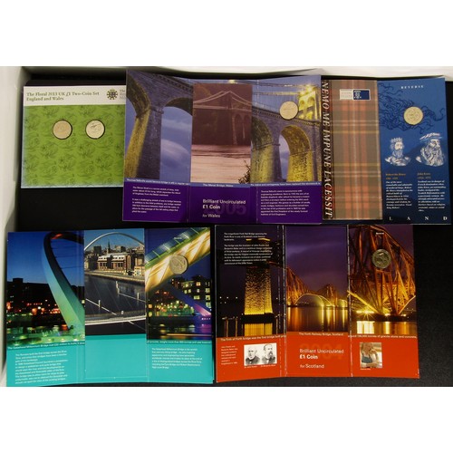 1334 - Royal Mint BUNC One Pound Coins in Presentation Packs (5). Wales, Menai Strait 2005. England, Tyne 2... 