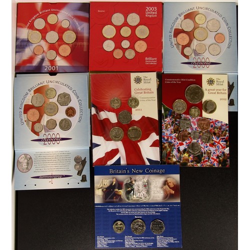 1337 - Royal Mint BUNC Coin Sets in Presentation Packs (7). 2003.  Britain's New Coinage 2005. 2011 Commemo... 