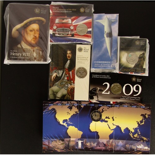 1348 - Royal Mint BUNC Five Pound Coins in Presentation Packs (7). Henry VIII 2009. Millennium 2000. Concor... 