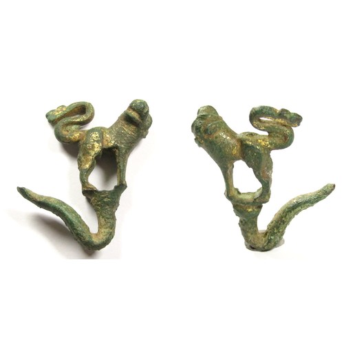 1077 - Medieval Zoomorphic Mount. Circa 13th-14th century AD. Copper-alloy, 16.89g. 38.56 mm. A gilt bronze... 