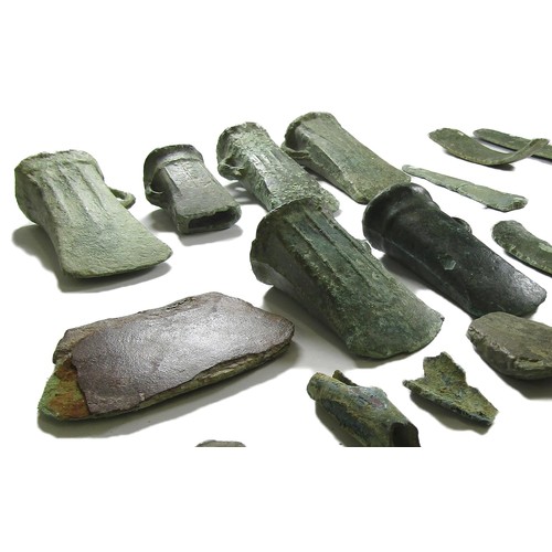 1001 - Bronze Age Hoard Assemblage. Circa 1100-900 BC. A selection of looped and socketed axe heads (6) mos... 