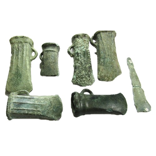 1001 - Bronze Age Hoard Assemblage. Circa 1100-900 BC. A selection of looped and socketed axe heads (6) mos... 