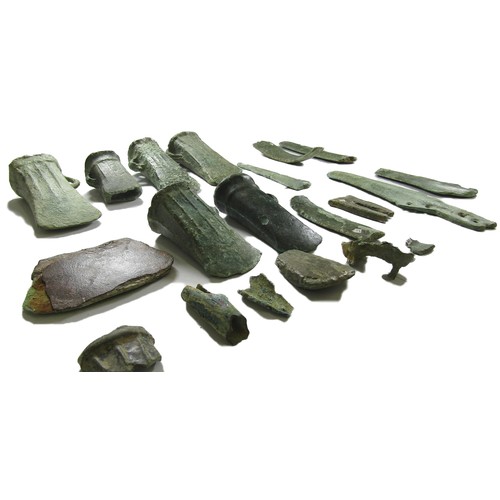 1001 - Bronze Age Hoard Assemblage. Circa 1100-900 BC. A selection of looped and socketed axe heads (6) mos... 