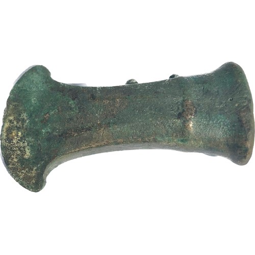 5 - Bronze Age Axe. Circa 950-800 BC. Copper-alloy, 148g. 90 mm. A faceted, looped and socketed axe head... 