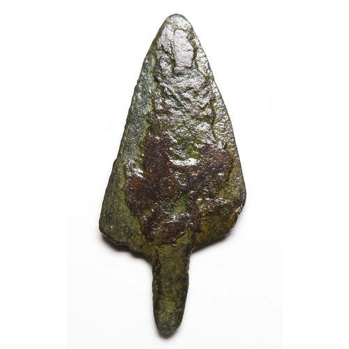 7 - Bronze age arrowhead c. 1250-800 BC. A mid to late Bronze age arrowhead of bevelled triangular form ... 