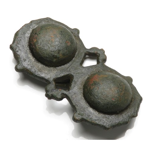 36 - Roman military strap mount. Circa 2nd century AD. Copper-alloy. Formed of two large domed studs on o... 