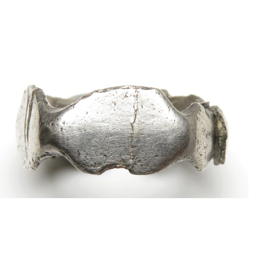 24 - Roman silver finger ring. Broken across one panel. 21mm diameter x 9mm, 3.5g. Approximate ring size ... 