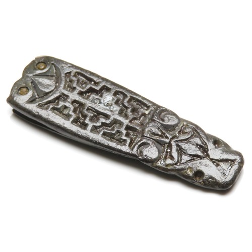 54 - Anglo-Saxon zoomorphic strap-end. Circa 6th century AD. Copper-alloy, 35mm x 10mm, 5.0g. A tapering ... 