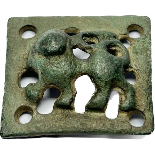 110 - Medieval Zoomorphic Mount. Circa 13th century AD. Copper-alloy, 6.75g. 21 mm. An open-work rectangul... 