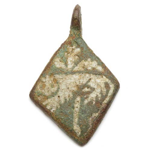 72 - Medieval Harness Pendant. Circa 14th century AD. Copper-alloy, 41mm x 27mm, 10.8g. A lozenge-shaped ... 