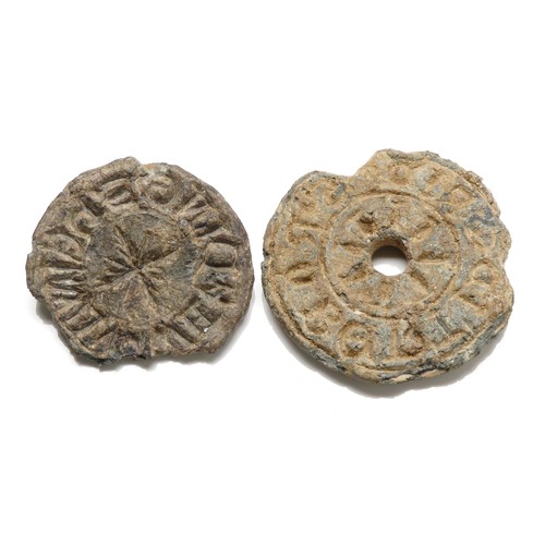 96 - Two medieval lead seal matrices c. 13th century. A circular seal matrix, centrally pierced, S' ROBER... 