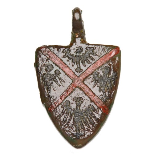 75 - Medieval Heraldic Pendant. Circa 13th-14th century AD. Copper-alloy, 39mm x 24mm, 9.0g. A shield-sha... 