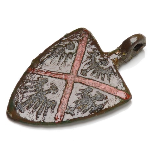 75 - Medieval Heraldic Pendant. Circa 13th-14th century AD. Copper-alloy, 39mm x 24mm, 9.0g. A shield-sha... 