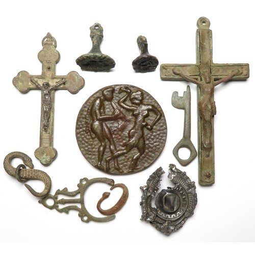 99 - Two medieval seal matrices and other artefacts including a medieval bronze key, two crucifixes, a sn... 