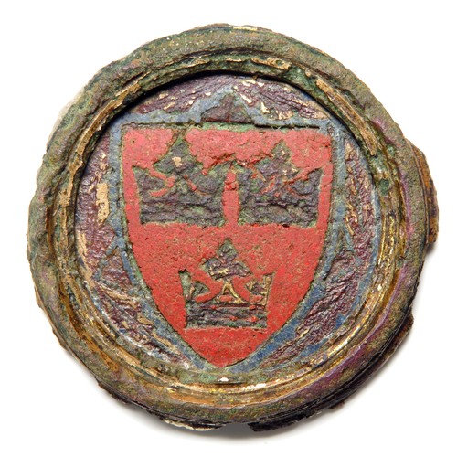 79 - Medieval Diocese of Ely heraldic enamelled roundel, circa 13th century. A thick bronze roundel ename... 