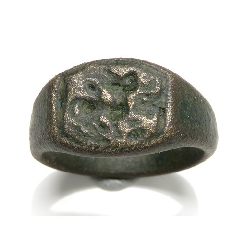 124 - Medieval Seal Ring. Circa 14th century AD. Copper-alloy, 25mm x 13mm, 10.1g. Ring size UK 10+3/4; US... 