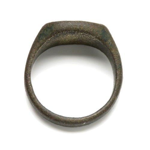 124 - Medieval Seal Ring. Circa 14th century AD. Copper-alloy, 25mm x 13mm, 10.1g. Ring size UK 10+3/4; US... 