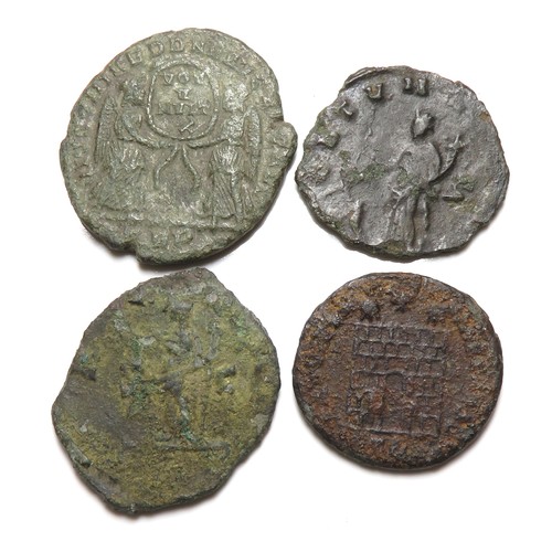 249 - Roman coin group including coins of Carausius, Magnentius and Gallienus. 4 coins, largest 23mm.