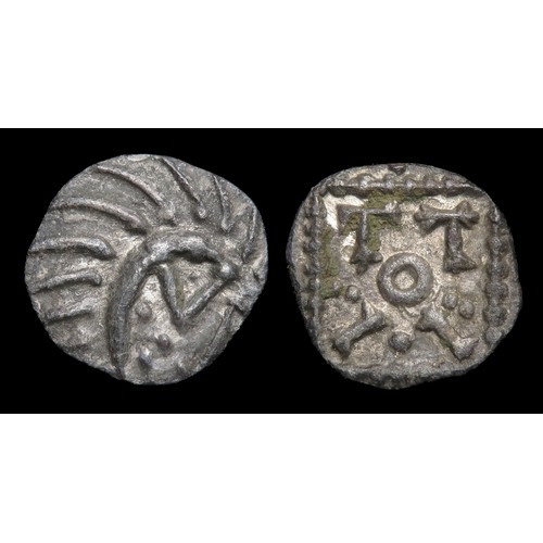 257 - Anglo-Saxon Sceatta, series E. Silver, 12mm, 0.92g. Coiled crescent right, triangular head with pell... 