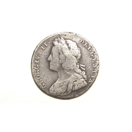 369 - George II Shilling. Silver, 5.57g. 26 mm. Young laureate bust left. R. Plain angles, 1728. Ref: Spin... 