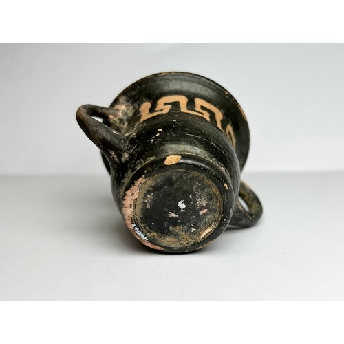 16 - Ancient Greek Minature Skythos Drinking-Vessel. Circa 4th century BCE. 42mm x 50mm. A twin handled t... 