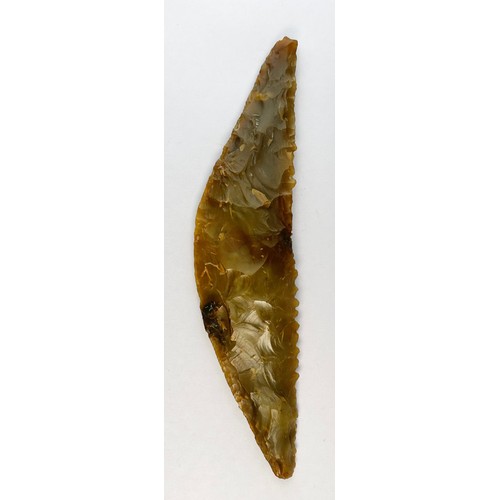 40 - Danish Neolithic Flint Sickle. Circa 3900-1700 BCE. 142mm x 33mm. A finely worked flint tool with se... 