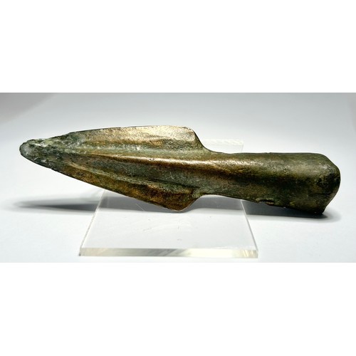 48 - Bronze Age Spear Head. Circa 1200-800 BCE. Copper-alloy, 106mm x 21mm 70.66 grams. A short socketed ... 