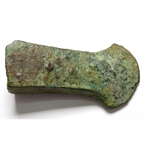 51 - Bronze Age Socketed Axehead. Circa 1200 BCE. Copper-alloy, 103mm x 54mm x 37mm, 236.8g. A heavy and ... 