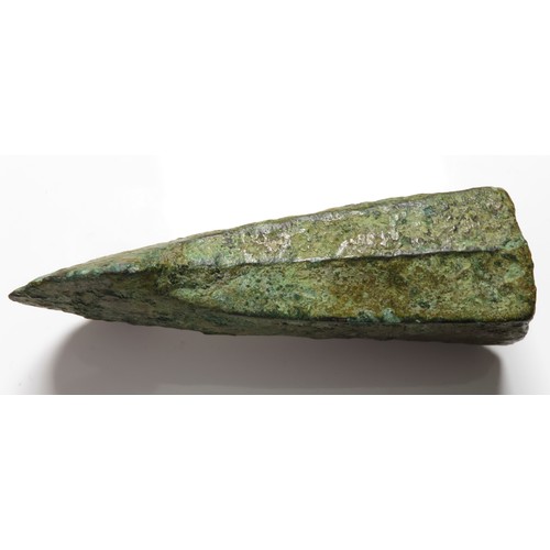 51 - Bronze Age Socketed Axehead. Circa 1200 BCE. Copper-alloy, 103mm x 54mm x 37mm, 236.8g. A heavy and ... 