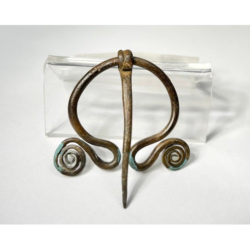 52 - Iron Age Pennnular Brooch. Circa 1st century BCE. Copper-alloy, 44mm x 41mm 6.40g. A plain ring with... 