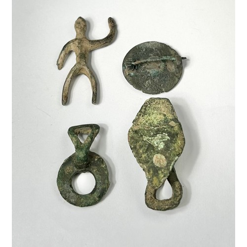 58 - Celtic Artefact Group (4). Circa 1st century BCE-1st century CE. To include, two toggle fasteners, b... 