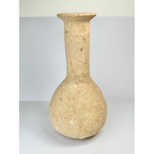 66 - Roman Terracotta Bottle. Circa 3rd century CE. 132mm x 65mm. A pottery vessel with bolbous body and ... 