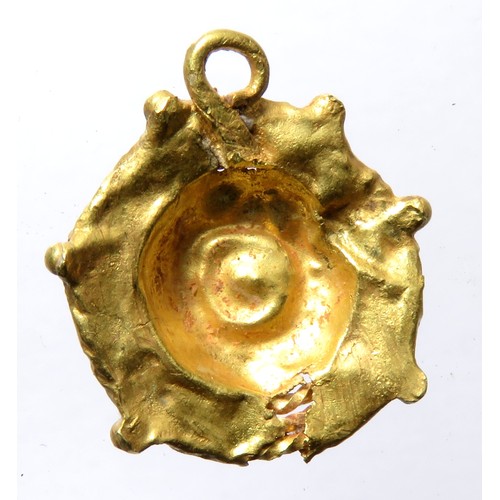 88 - Roman Gold Pendant. Circa 3rd century CE. 17mm x 15mm 1.39g. A circular pendant formed of three conc... 