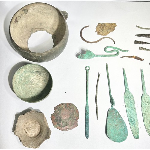 93 - Ancient Metal Work And Pottery Group. Circa 1st century BCE-3rd century CE. An interesting lot to in... 