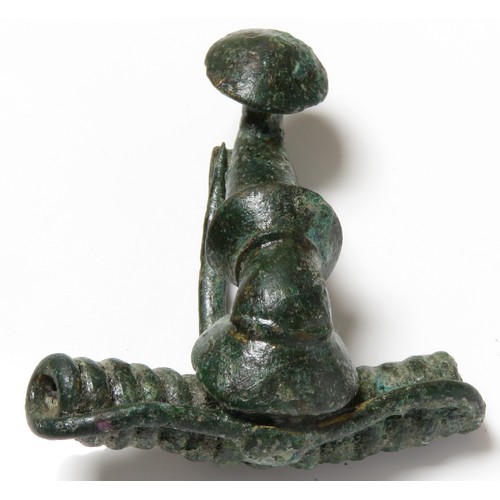 84 - Roman bronze fibula. Circa 1st century CE. Copper-alloy, 47mm x 43mm, 28.9g. A trumpet type with a l... 