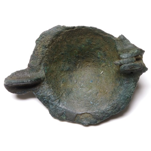 82 - Roman umbonate brooch. Circa 2nd century CE. Copper-alloy, 42mm, 11.5g. A spoked wheel form with pan... 