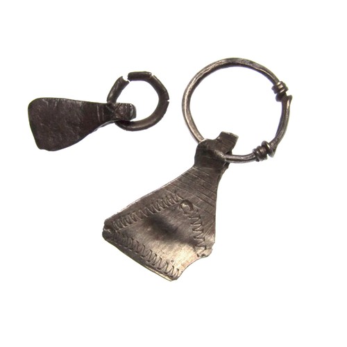 127 - Viking Silver Axe Pendants. Circa 10th-11th century CE. Silver, 33mm x 15mm 20mm x 8mm. Two axe shap... 